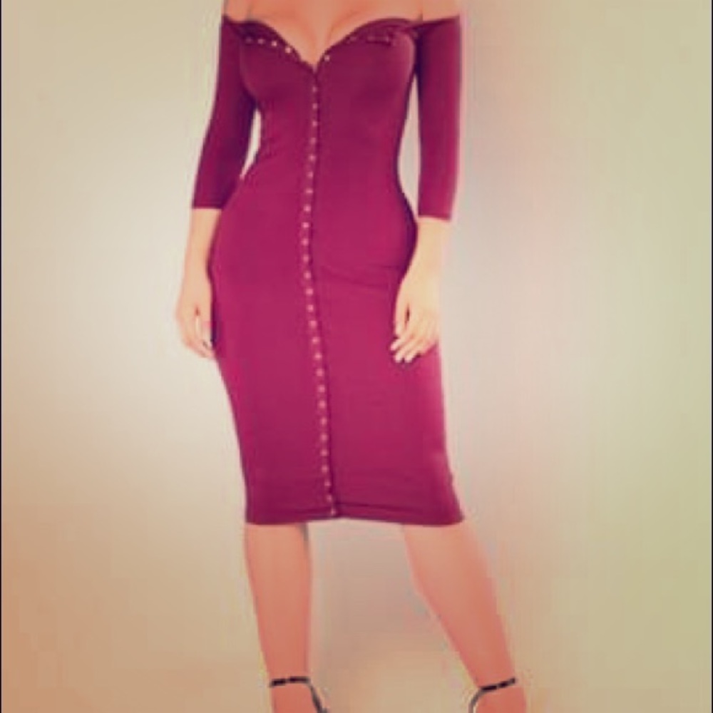 Comfortable burgundy button up dress, never worn.